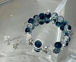 Edelsteen armband galaxy met een zilveren bedel. Nu voor €12,50-,