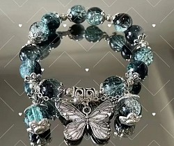 Vlinder edelsteen kristal blauw/groen armband nu voor €12,50-, per stuk